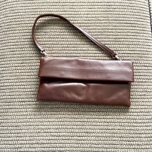 Brown leather clutch
